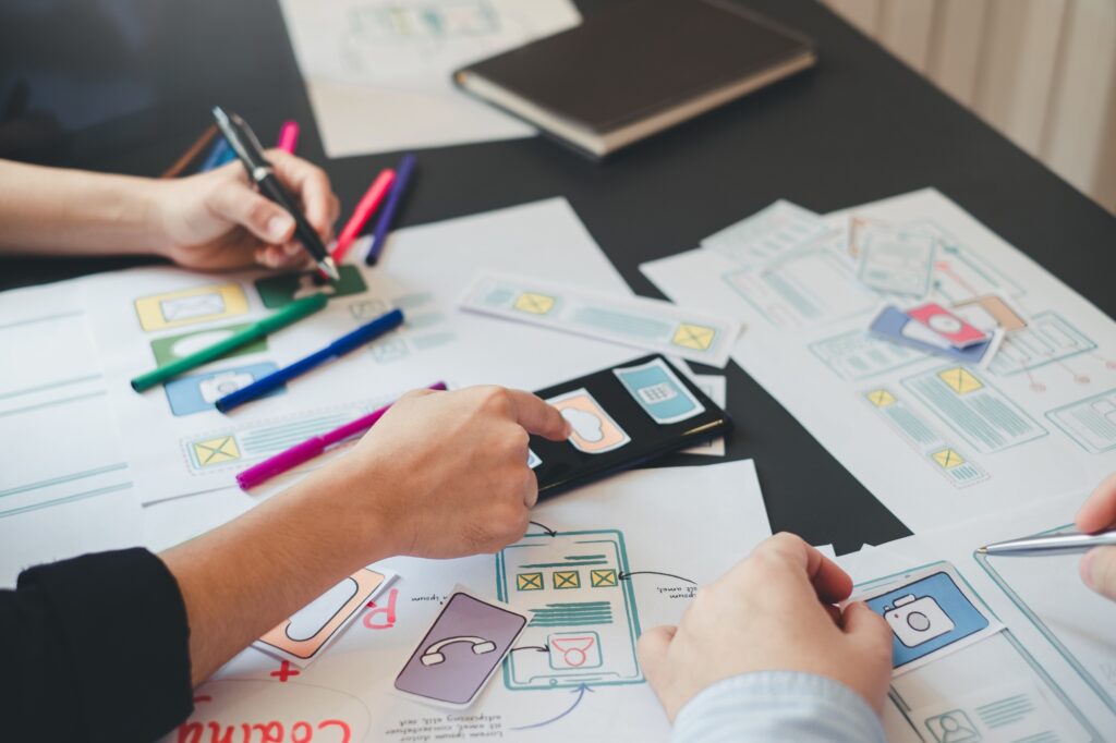 Teamwork graphic designers creative drawing website ux app development