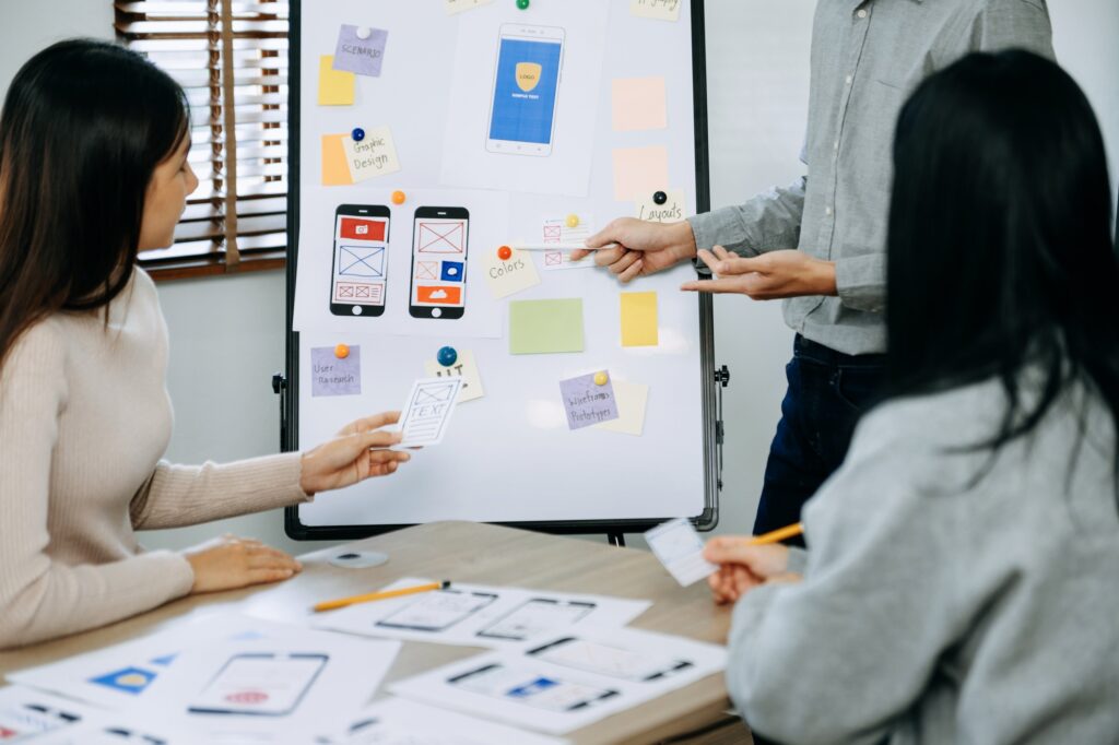 UX graphic designer planning application process development prototype wireframe for web smart phone